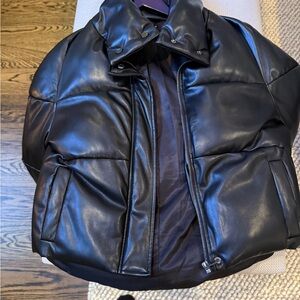 Apparis black leather puffer jacket